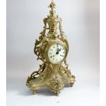 A large French gilt metal mantel clock with elaborate foliate and floral case, 64cm high, glass a/f