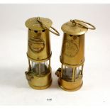 Two brass mining lamps