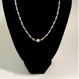 An 18 carat gold and rose quartz bead necklace