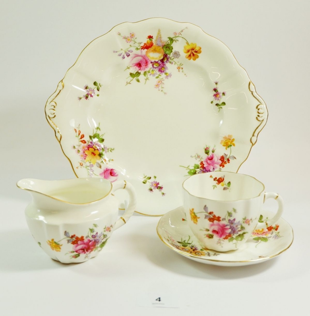 A Royal Crown Derby tea service printed flowers comprising: seven cups (one a/f) and seven