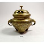 A small Chinese brass censer with incised decoration and elephant handles, 14cm tall