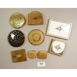 A box of compacts including handbag musical compact