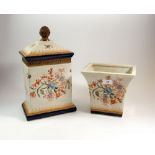 A pair of large floral ceramic boxes with pineapple finials, 36cm and a pair of matching vases