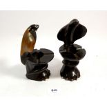 Two ebony cobra head and elephant ashtrays, 17.5cm tall