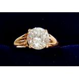 A 14 carat gold dress ring set solitaire white stone, size N to O