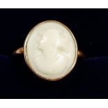 A antique yellow metal ring set carved shell cameo, size P