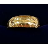 An 18 carat gold ring, 5.2g
