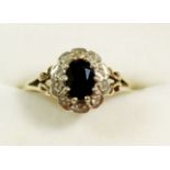 A 9 carat gold sapphire and diamond cluster ring, size Q, 2.3g