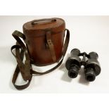 A pair of WWI Ross Prismatic No 6 binoculars with broad arrows mark, in leather case