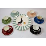 A Susie Cooper vintage harlequin set of six cups and saucers (one a/f) plus a Mason's Circusland