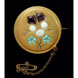 A Victorian gold circular brooch inlaid pansy decoration in amethyst, turquoise, opals and diamonds,