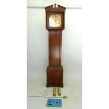 A Martin Heath oak longcase clock with brass dial and a German movement