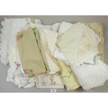 A box of embroidered and crochet edged table linen etc