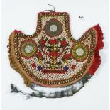 An antique North American beadwork breast plate, 21.5 x 26cm