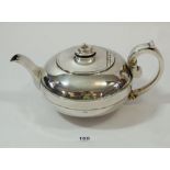 A Georgian silver teapot of spherical form, London 1815 by Michael Starkey 650g (with ivory spacers,