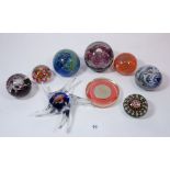 A selection of glass paperweights including Caithness