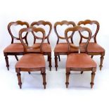 A set of six of Victorian triple balloon back dining chairs on turned supports