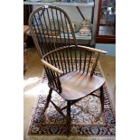 A 19th century stick back Windsor chair on turned supports