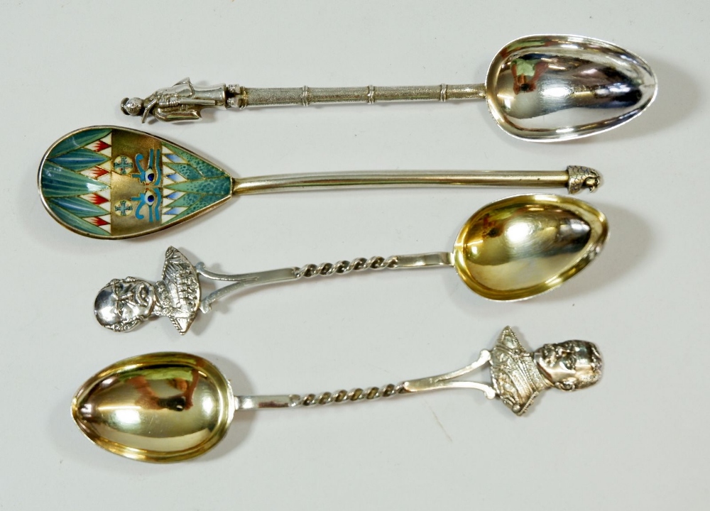 Two silver teaspoons with military terminals, Chester 1899 and two Eastern white metal teaspoons