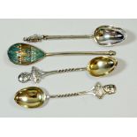 Two silver teaspoons with military terminals, Chester 1899 and two Eastern white metal teaspoons