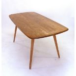 An Ercol light elm dining table 153 x 76cm w x 72h