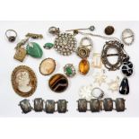 A box of antique costume jewellery including silver marcasite rings and paste