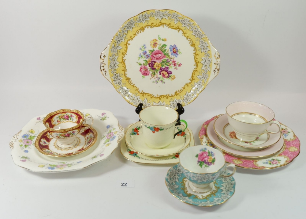 A collection of decorative cups and saucers including Royal Albert, Tuscan etc.