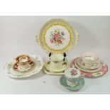 A collection of decorative cups and saucers including Royal Albert, Tuscan etc.