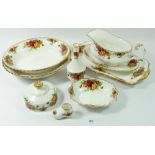 A group of Royal Albert 'Country Roses' serving items and ornaments including three serving