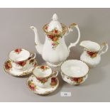 A Royal Albert 'Country Roses' tea and coffee service comprising: teapot, five bowls, two sugar