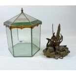 A vintage glass tererarium with removable lid and a bronze vase base with swans and leaves, 22cm