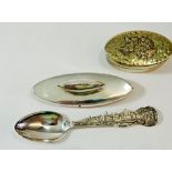 An American sterling silver 'Chicago' spoon, a silver nail buffer and a silver plated oval box