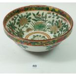 A Chinese bowl with floral decoration, 18cm diameter