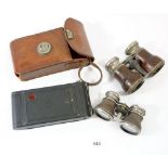 An Eastman Kodak No 1 Pocket Camera and two pairs of opera glasses