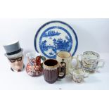 A blue and white cake stand, two 'Speed the Plough' mugs, Kings Rifles tankard etc.