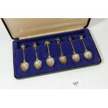 A QEII Silver Jubilee 1977 set of six silver teaspoons with cast Royal motif terminals, boxed