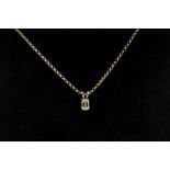 A 14 carat gold pendant set emerald cut diamond on 9 carat gold chain, 3.1g