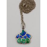 An Art Nouveau style Studio silver and enamel double sided pendant on silver chain