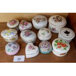 A collection of decorative porcelain boxes
