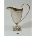 A Victorian silver helmet form cream jug, Chester 1899, 123.8g