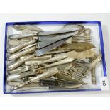 A group of German 800 standard and white metal cutlery comprising: a set of six serving spoons