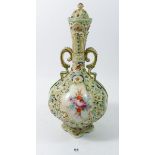 A Victorian vase and cover with floral painted decoration, 32 cm tall