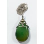A silver and green stone Arts & Crafts pendant in the style of Bernard Instone on silver chain, 4.