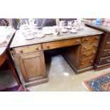 A Victorian oak twin pedestal desk, 126cm wide