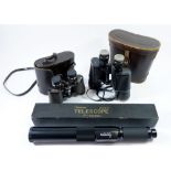 Two pairs of binoculars (one by Lieberman & Gotz) and a field telescope by Greenkat, boxed