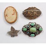 Four various brooches including silver maple leaf, white metal cameo, Victorian inlaid brooch and