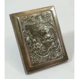 A silver photograph frame with embossed hinged front, 11.5 x 9cm