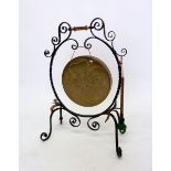 An Arts & Crafts wrought iron and brass gong, 69cm tall