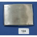 An Adie Bros silver curved cigarette case, monogrammed JCB, Birmingham 1927, 157.9g