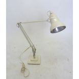 A vintage anglepoise lamp with Herbert Terry label